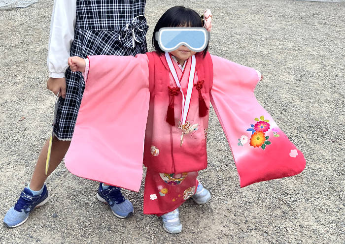 晴着できめのポーズ